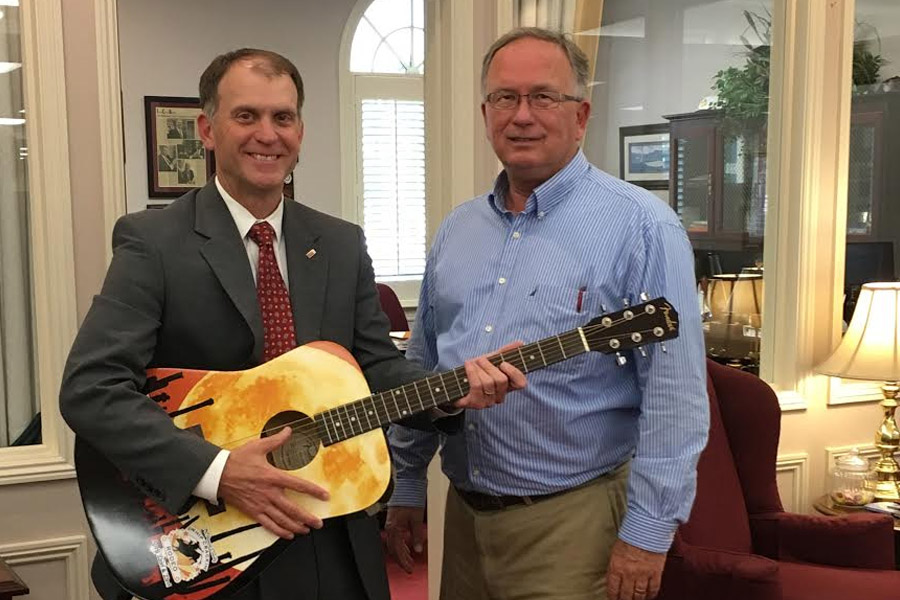 Mayor Philip Craighead presents a Commemorative Guitar to Platinum Sponsor John McDearman of Wilson Bank & Trust