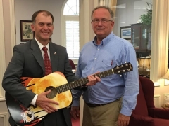 Mayor Philip Craighead presents a Commemorative Guitar to Platinum Sponsor John McDearman of Wilson Bank & Trust